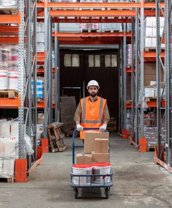 Warehouse Worker Handling Material